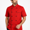 Red Chef Coat by SP Uniform – bold red design with black piping and a modern 2 Side Button style for professional chefs and hospitality teams.